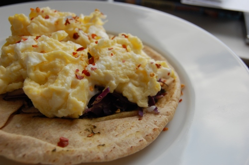 Pita smeared with pesto, 1 egg and eggwhites, sprinkle or red cabbage